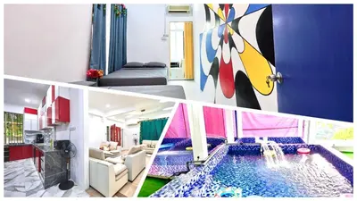 a living room with a swimming pool in a house at Penang Dream Banglo Events up to 120 Pax in Tanjung Bungah
