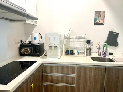 a kitchen with a sink and a counter top at Ipoh Town Majestic 3R2B 10paxs Remi Suite in Ipoh