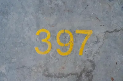 a yellow number on the floor of a street at Ipoh Tambun Sunway Onsen Suite 3R2B Maya in Tambun