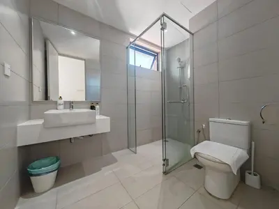 a bathroom with a sink toilet and a shower at Harmony Haven with Bathtub - Jazz Suites by Ocean Luxe in Tanjong Tokong