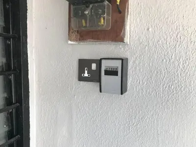 a electrical outlet on a white wall at Wi-Fi 100MB Free Ipoh Holiday Suite Taman Anda A5 in Ipoh