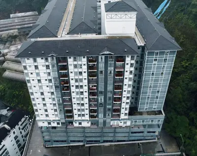 an overhead view of a tall building with a black roof at D'Elegant Suite - Emerald Avenue in Cameron Highlands