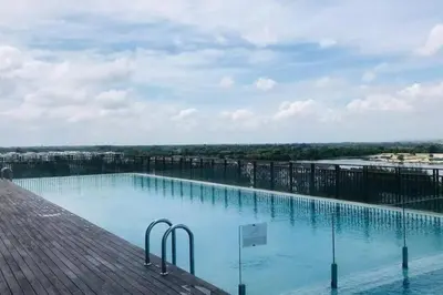 a large swimming pool on top of a building at Champs Elysees by Landmark @ Kampar in Kampong Malim Nawar