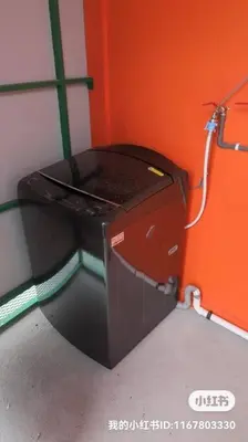 a corner of a room with a washing machine at Ipoh town centre eastern oriental 8 pax(2BR) in Ipoh