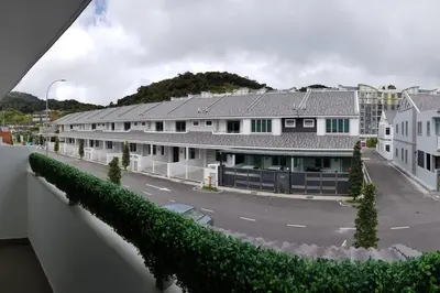 arial view of a street with a row of buildings at Cosy 2-Storey Holiday Home Vines 2 @Pasar Malam -1 in Brinchang