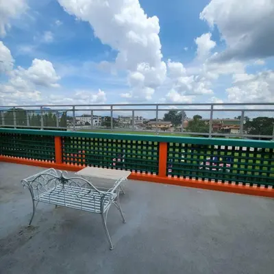a bench sitting on top of a roof at ipoh town centre - nordic 7pax in Ipoh
