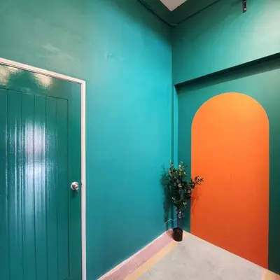 a room with a door and a plant in front of it at Ipoh town centre -rustic home 4pax (studio 5) in Ipoh