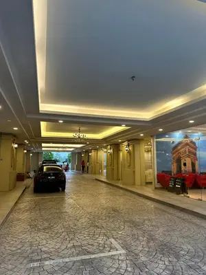 a car parked in the middle of a building at Champs Elysees Homestay by Landmark @ Kampar in Kampar