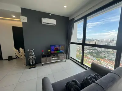 a living room with a couch and a large window at New Brand KTV SET, Netflix, 3 Queen Bed High Floor in Jelutong