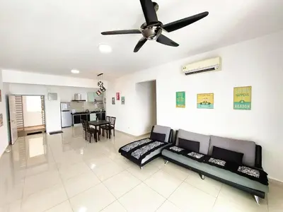 a living room with a couch and a ceiling fan at SR28-HousePrivate-3room-BigHouse in Bayan Lepas