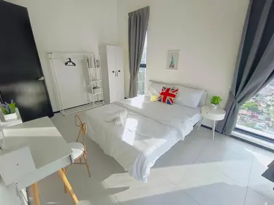 a bedroom with a white bed and a large window at Infinity Pool, Georgetown, Up to 11 Pax, 2 Bedrooms, 2 Bathrooms, 2 Car Parks by Star Home in Jelutong