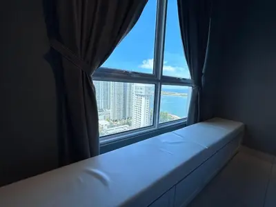 a room with a window with a white mattress in front at Seaview Mansion One 2R2B George Town Gleneagles Gurney Komtar by Cozy Cottage Haven in George Town