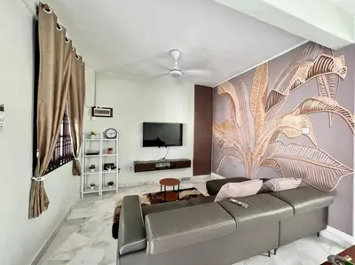 a living room with a couch and a tv at Sarah homestay Muslim Permatang Pauh in Permatang Pauh