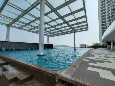 a pool on the roof of a building at Southbay Seaview Condo A11 #Queensbay #SPICE in Bayan Lepas