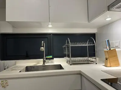 a kitchen with a sink and a counter top at Tropicana 218 Macalister WL in George Town