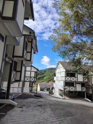 an empty street in a village with buildings at Sunrise View One Bedroom Apartment at Equatorial Hill Resort in Brinchang