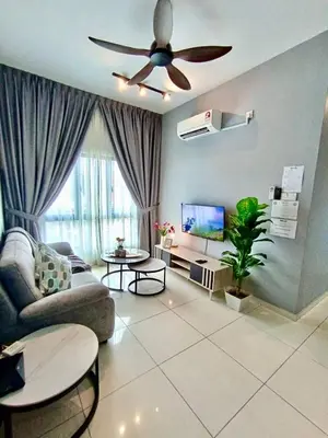 a living room with a couch and a ceiling fan at The Horizon Ipoh L8 by Grab A Stay in Ipoh