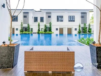 a swimming pool in the middle of a house at Premium Holiday Suite beside Lost World Tambun at Sunway Onsen in Tambun