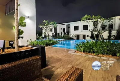a swimming pool in the middle of a building at Premium Holiday Suite beside Lost World Tambun at Sunway Onsen in Tambun