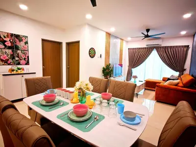 a living room with a dining table and a living room at Ipoh Manhattan Waterpark View 3BR Condo by City Home Empire MHD704 in Ipoh
