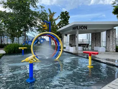 a water park with a water slide in a pool at Urban Suites - George Town, Penang in Jelutong