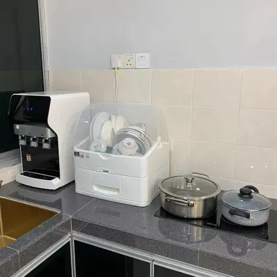 a kitchen counter with a coffee maker and pans at Sekinchan Simple Love SeaHouse - PaddyView 8-7A in Sekincan
