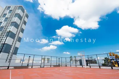 a basketball court in front of a building at Summer Cozy Big Studio in Perai