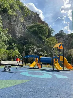 a playground with several slides at IPOH TAMBUN THE COVE Your Ultimate Relaxation Getaway777 -3 BED ROOM -NO PETS ALLOW in Ipoh
