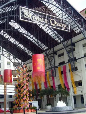 a building with a christmas tree in front of it at Perfect Marina @ Strait Quay /w Exclusive Stay in Tanjong Tokong