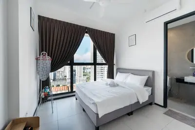 a bedroom with a bed and a large window at NEW Infinity Pool Seaview Urban Suite #2Carparks #2BR 23a5 in Jelutong