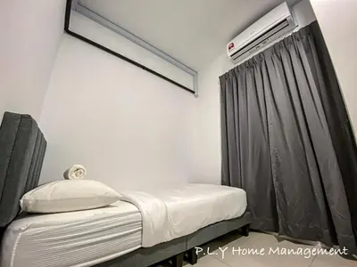 a small room with a bed and a air conditioner at Crystal Cozy Suite PoolView Netflix Waterpark@ Ipoh Station 18 in Ipoh