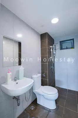 a bathroom with a toilet and a sink at Cozy&Comfy Suite Room Perai in Perai