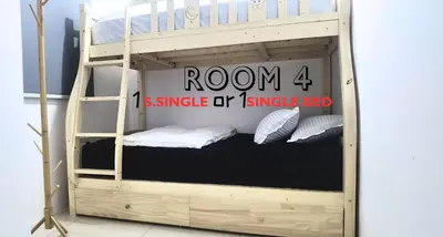 a bunk bed in a room with a bunk bed frame at Ipoh Water Park(14pax) Homestay@HopeStay in Ipoh