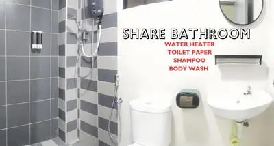 a bathroom with a shower and a toilet and a sink at Ipoh Water Park(14pax) Homestay@HopeStay in Ipoh