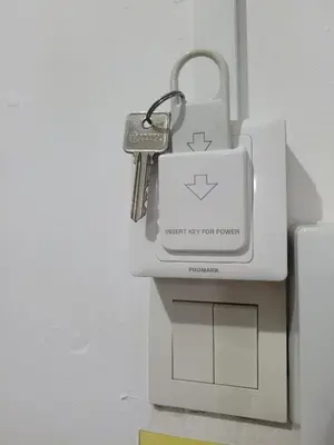 a pair of keys sitting on top of a box at Pangkor BeachWalk Studio in Pangkor