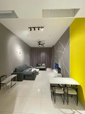 a living room with a couch and a table at Penang Georgetown KT Home for 8 pax in George Town