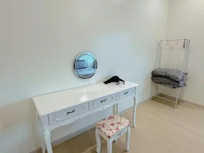 a bathroom with a white sink and a mirror at Sekinchan 2008 Homestay \u60a6\u5ba2 \u6cd5\u5f0f\u5976\u6cb9\u98ce\u6c11\u5bbf in Sekincan