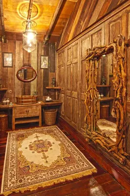 a living room with a large mirror and a rug at Fig Tree Hills Resort (\u82b1\u679c\u5c71\u5ea6\u5047\u6751) in Bayan Lepas