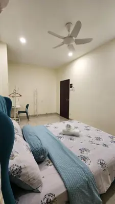 a bedroom with a bed with a ceiling fan at La Belle Maison 12 @ Gurney Kelawai/Pulau Tikus/Georgetown in George Town