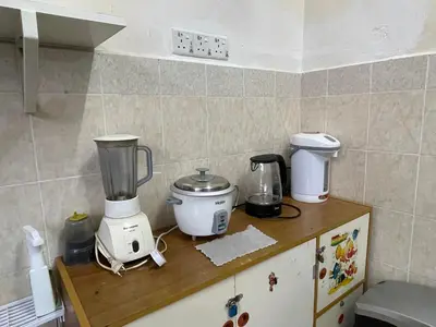a kitchen counter with a blender on top of it at Myra Homestay Bertam, Penang in Kepala Batas