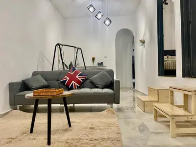 a living room with a couch and a table at Home39#4pax#jpnstyle#netflix#NearIconCity in Bukit Mertajam