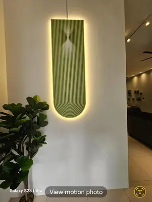 a light fixture on a wall in a room at Sunway Ipoh - DamaiStay - 5min to Tambun - 20Pax in Tambun