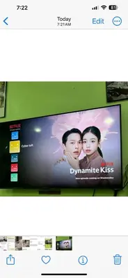 a television screen with a movie on it at BOTANI LOFT HOMESTAY in Ipoh