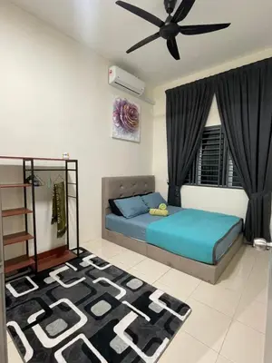 a bedroom with a bed and a ceiling fan at D’Kayangan Homestay BBSAP Sitiawan in Sitiawan