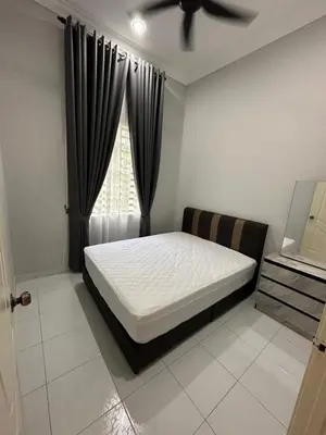 a bedroom with a bed and a window at D’Asam Homestay Baling in Baling