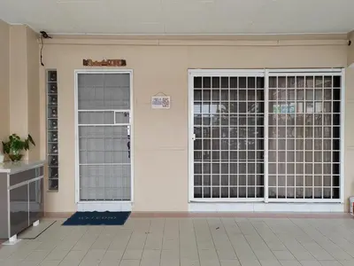 an entrance to a building with doors and gates at Ipoh Station 18 Homestay in Ipoh