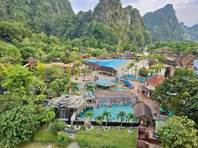 an aerial view of a resort with two swimming pools at Hotspring 2 Room Suite @ Sunway Onsen with Theme Park View 4 to 6 pax in Tambun