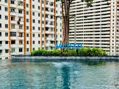 a large body of water in front of a building at New 2BR or 3BR Homey Getaway stay 7 to 10 pax at Urban Suites, Georgetown by URBAN STAYCATION LOD COSY in Jelutong