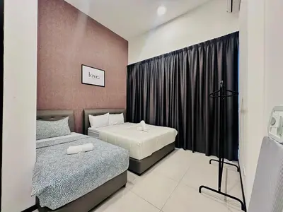 a bedroom with two beds and a black curtain at New 2BR or 3BR Homey Getaway stay 7 to 10 pax at Urban Suites, Georgetown by URBAN STAYCATION LOD COSY in Jelutong