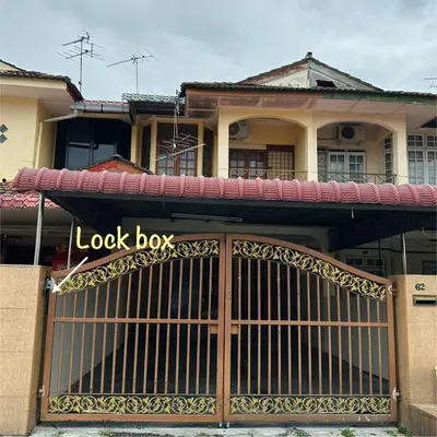 a lock box sign on a gate in front of a house at CYC homestay 18 pax in Kampong Batu Lapan